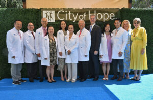 DUARTE, CALIFORNIA - SEPTEMBER 12: (L-R) Dr. Ed Kim, Dr. Richard Lee, Brian Lai, Nicole Cherng, Andrea Cherng, Peggy and Andrew Cherng, co-founders, Panda Express, Robert Stone, CEO, City of Hope, Michelle Cherng Lee, Benjamin Lee, Kristin Bertell, Chief Philanthropy Officer, and Sharon Joyce attend the unveiling of the Cherng Family Center for Integrative Oncology at City of Hope Comprehensive Cancer Center - Duarte on September 12, 2023 in Duarte, California. (Photo by Lester Cohen/Getty Images for City of Hope)
